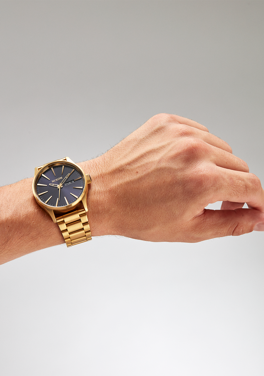 Nixon Mens Sentry SS Stainless Steel Watch Gold/Indigo