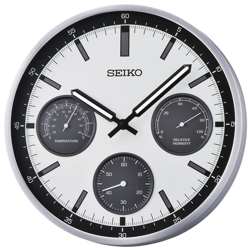 Seiko wall clock with temperature and humidity indicators on a white background