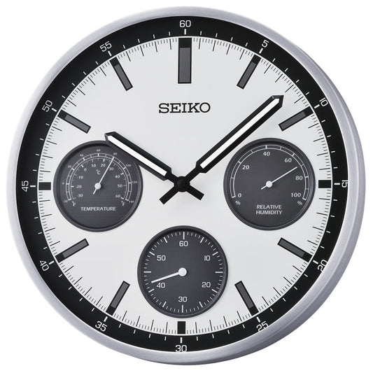 Seiko wall clock with temperature and humidity indicators on a white background